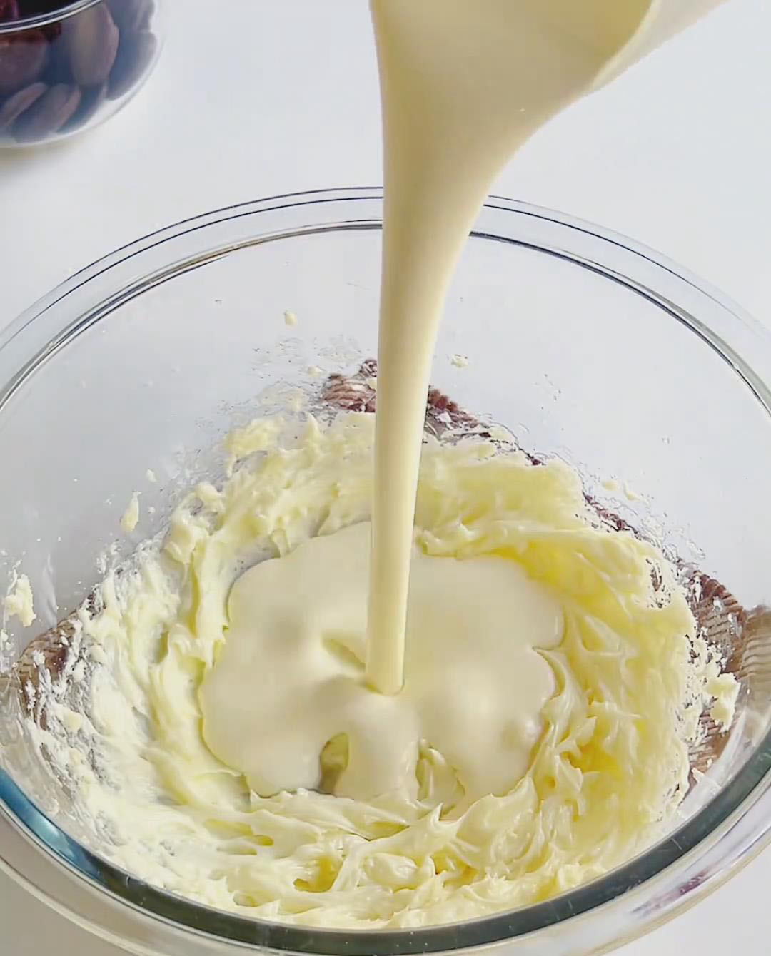 Add 135g chilled heavy cream and whip on low speed