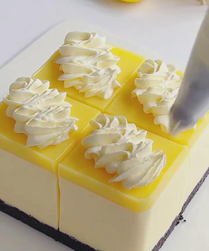 Pipe rosettes or borders along the edges of the cake or onto individual slices