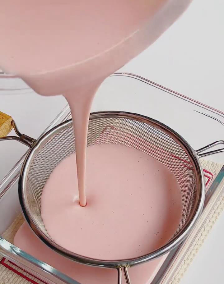 Pour the batter through a fine mesh sieve into a heat proof bowl