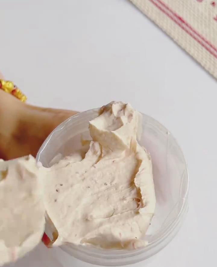 Transfer the strawberry cream filling into a piping bag