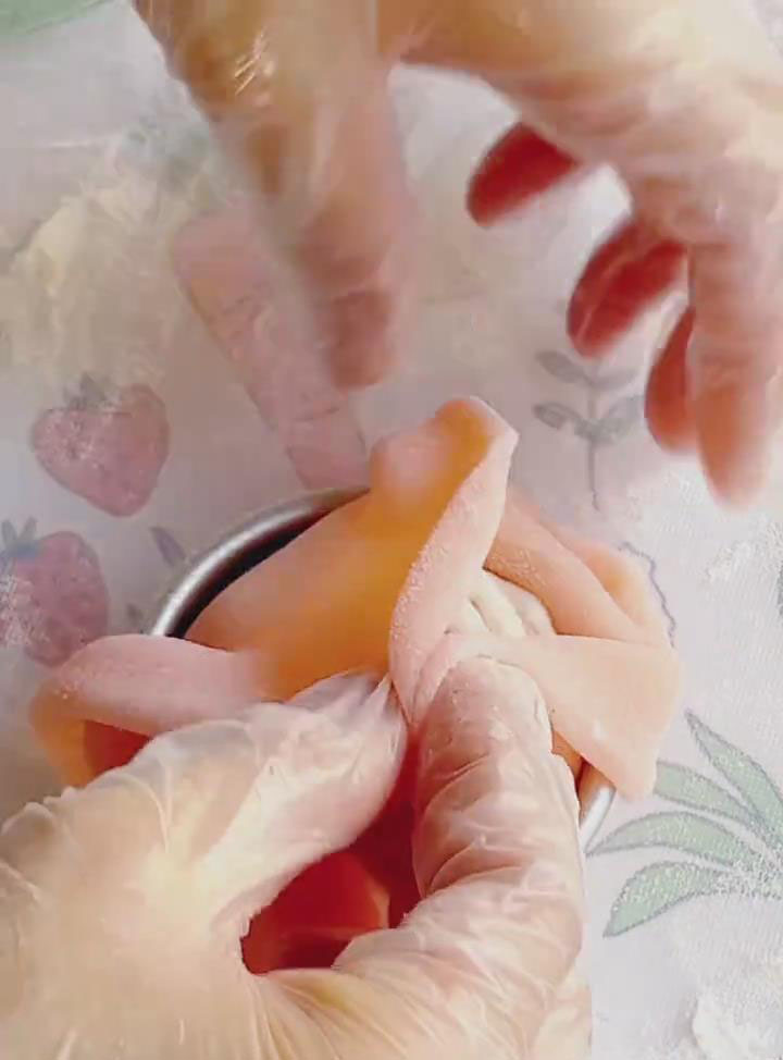 gather the edges of the dough around the filling