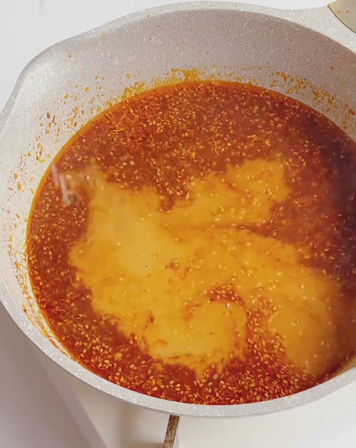 slowly pour in the cornstarch slurry while stirring constantly