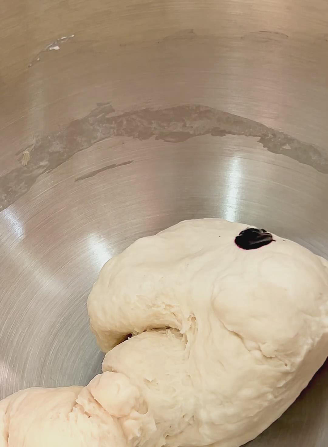 Add a few drops of red food coloring to the dough