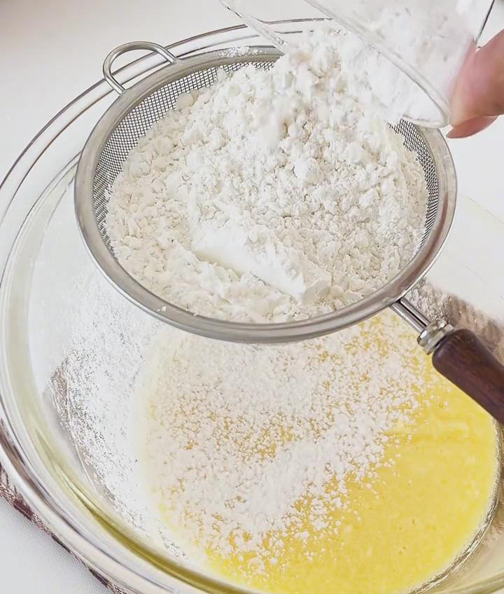 Sift in the cake flour