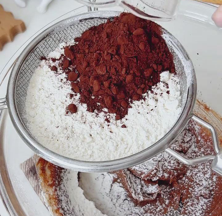 Sift together cake flour, cocoa powder, and baking powder