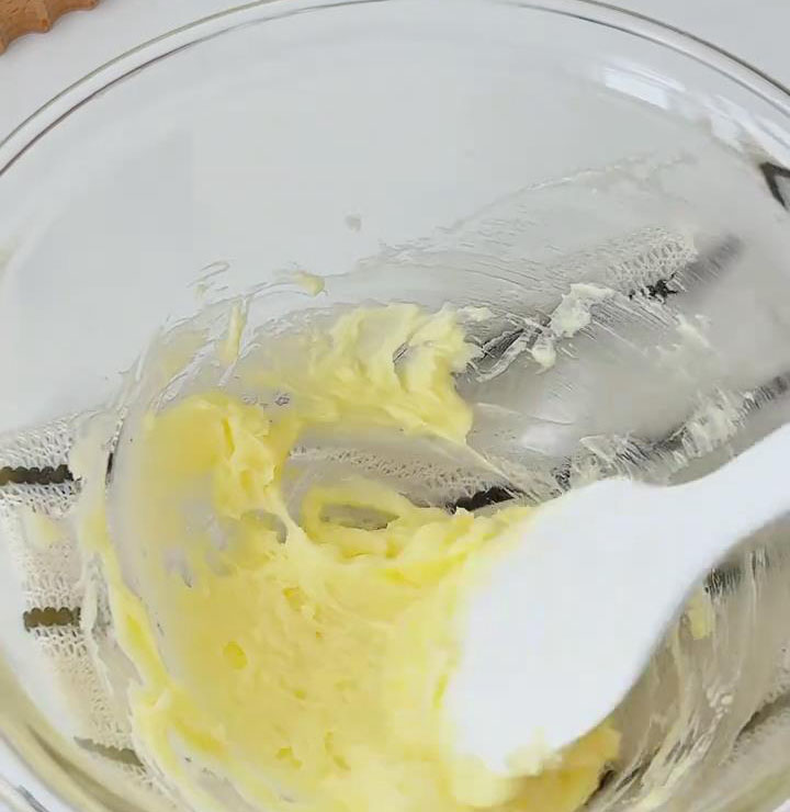 mixing well after each one to prevent curdling