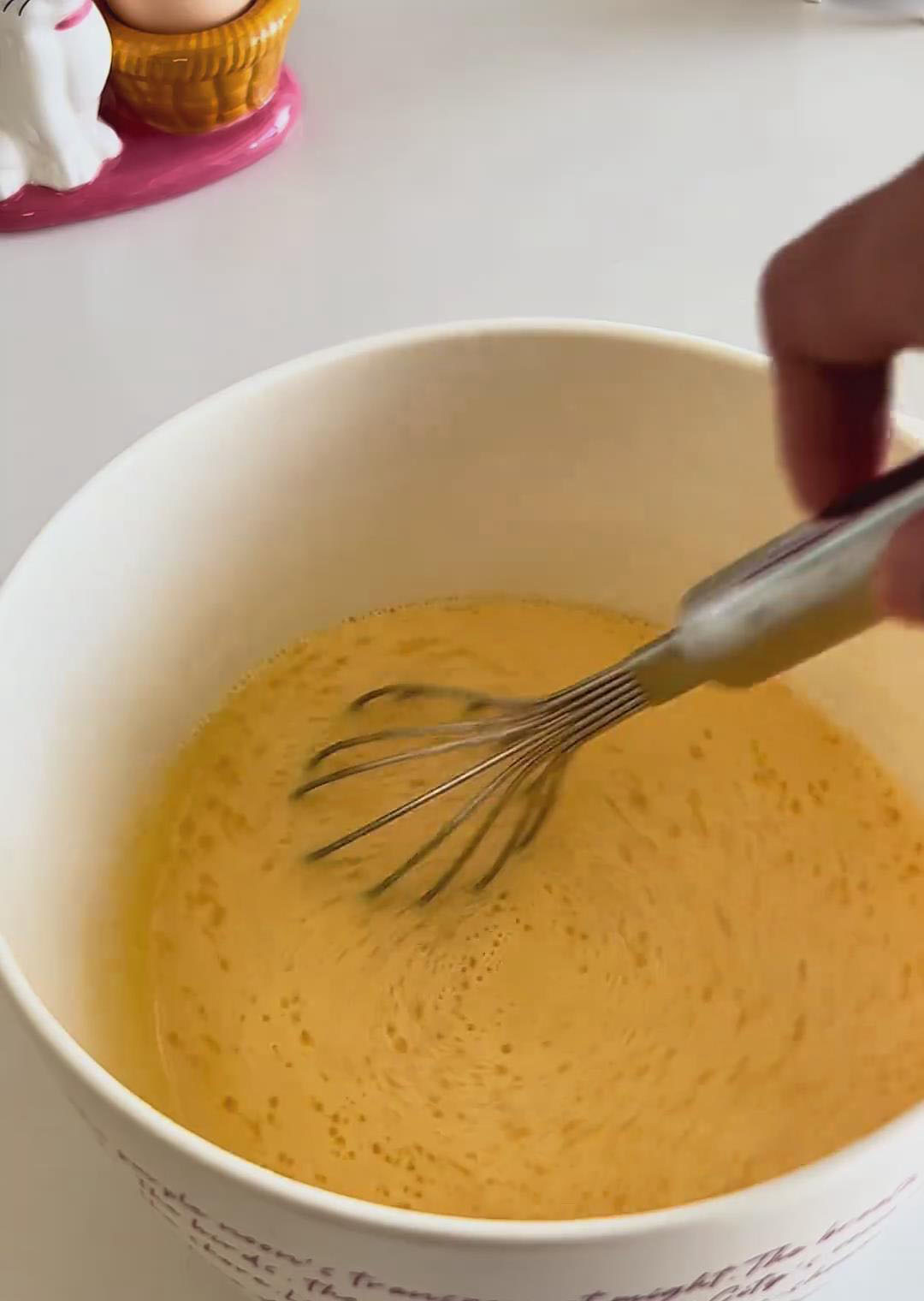 Add the milk and corn oil, whisking until fully combined