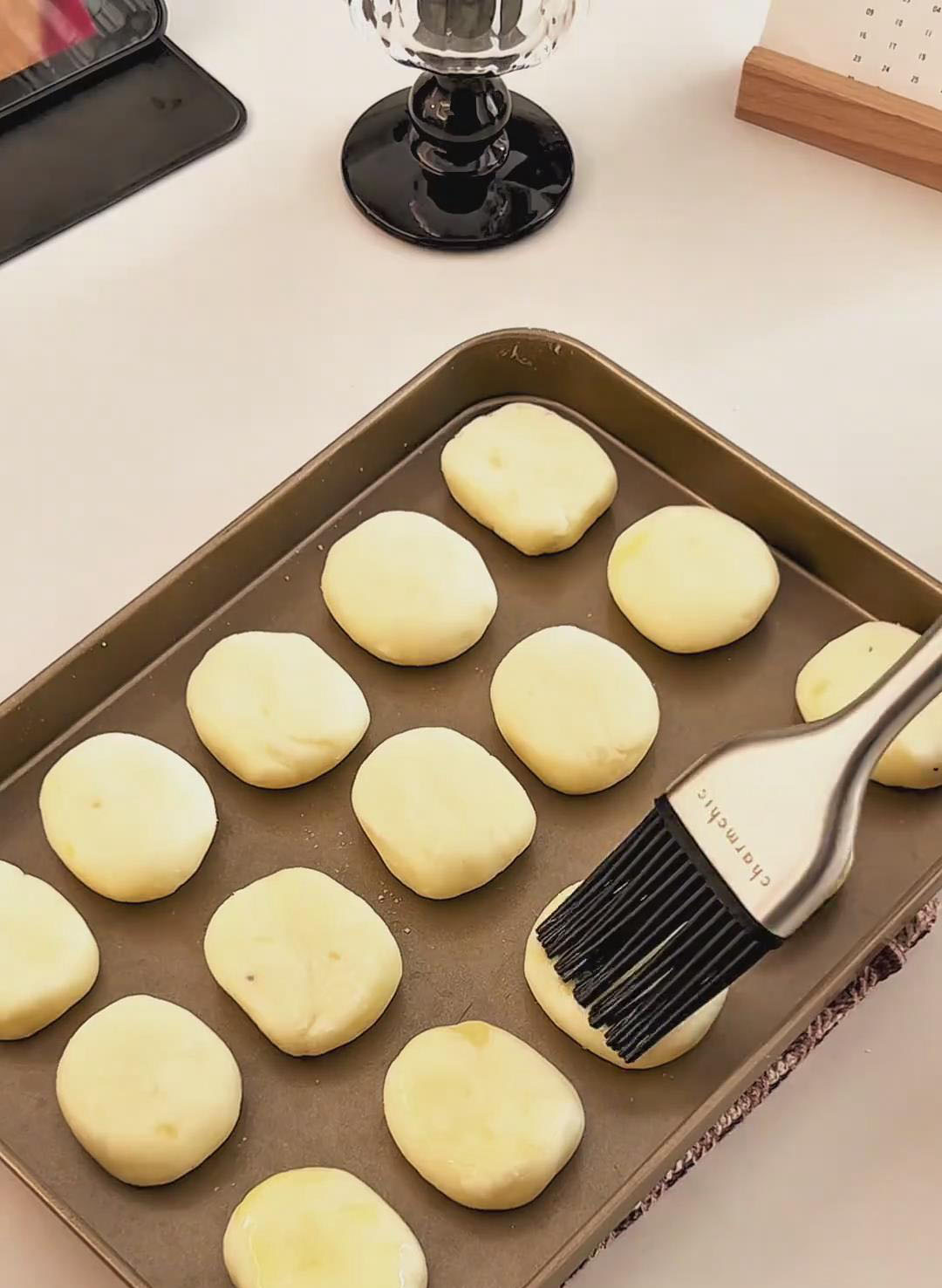 Arrange the shaped potato pops on a baking tray