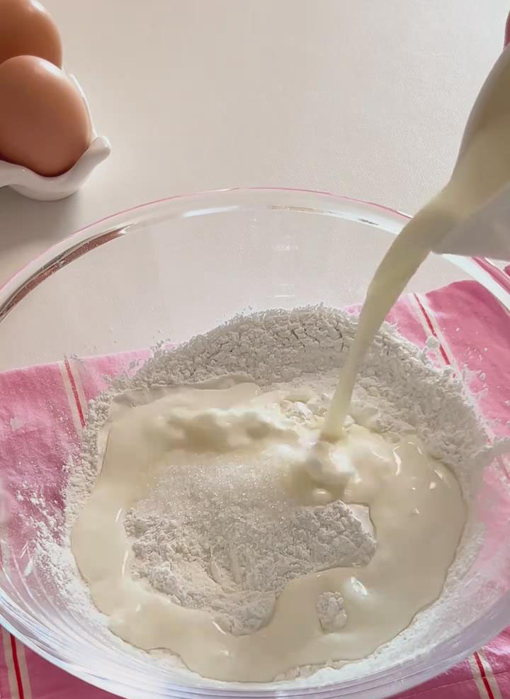 Gradually whisk in the 160ml of milk