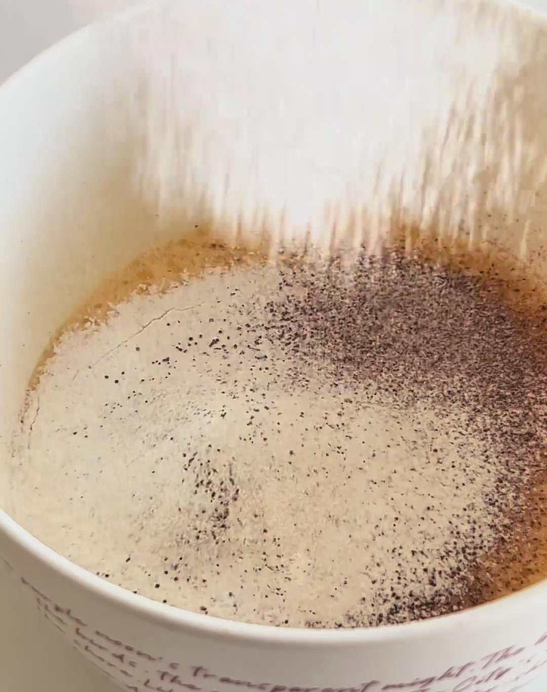 Sift in the cake flour and cocoa powder