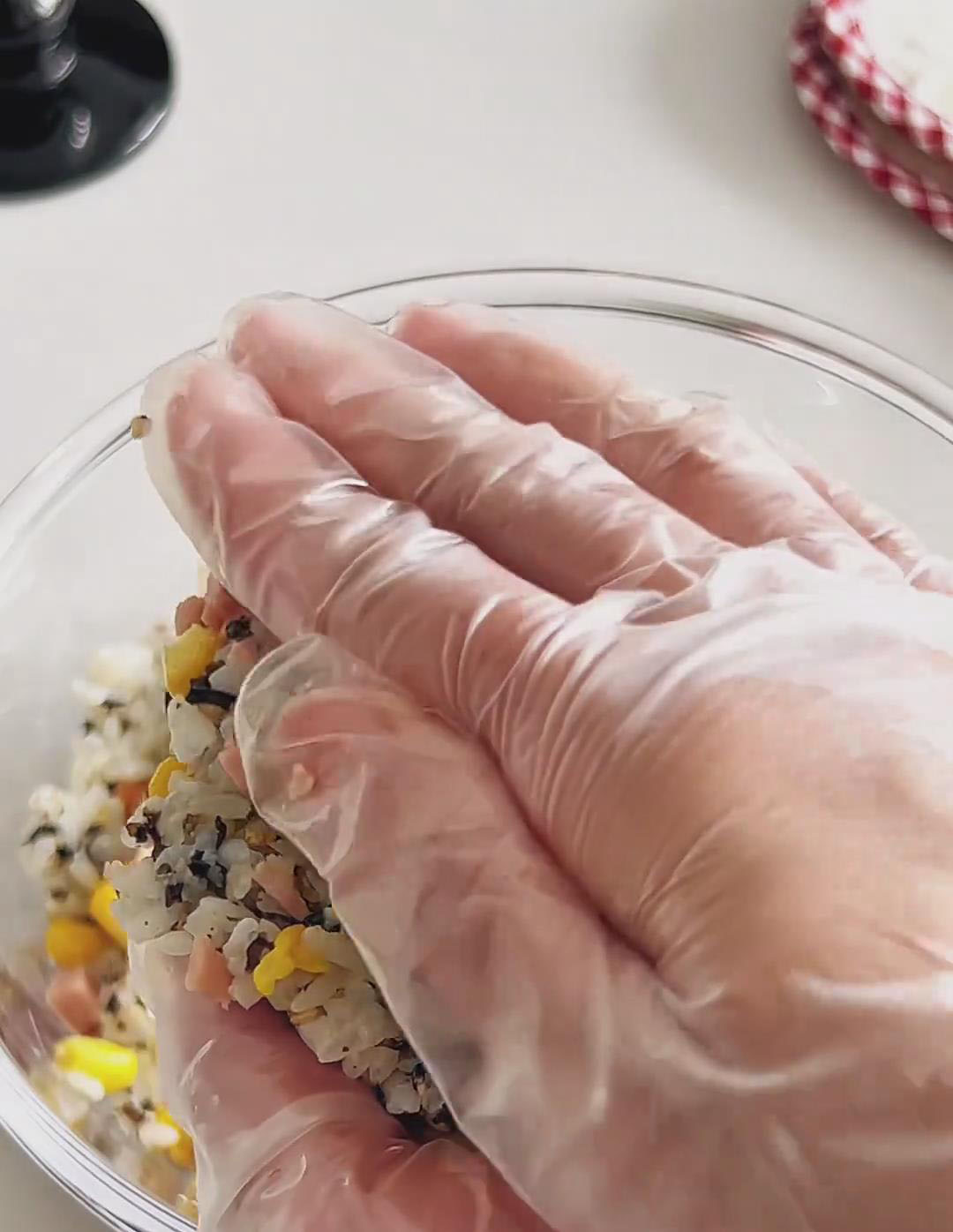 Top with another small portion of rice