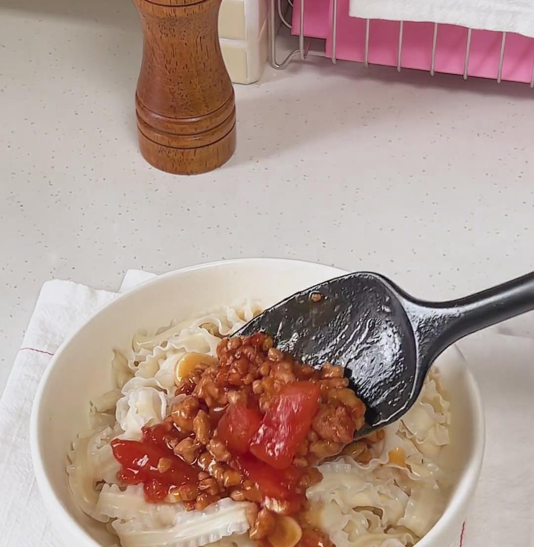 spoon the hot tomato meat sauce generously over the top