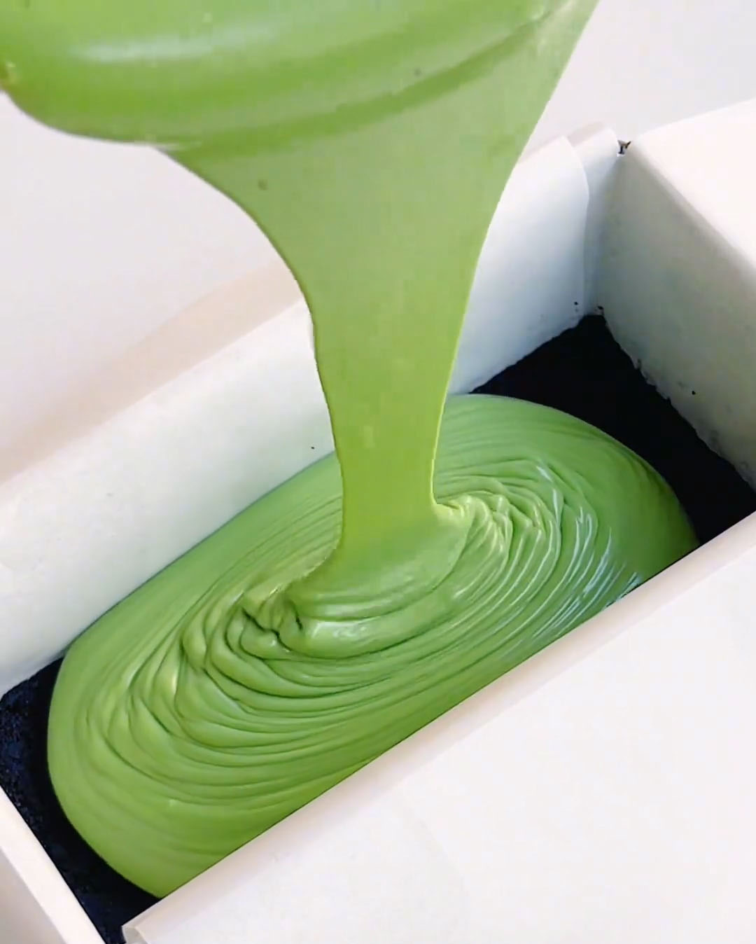 Pour in the plain matcha cheesecake filling