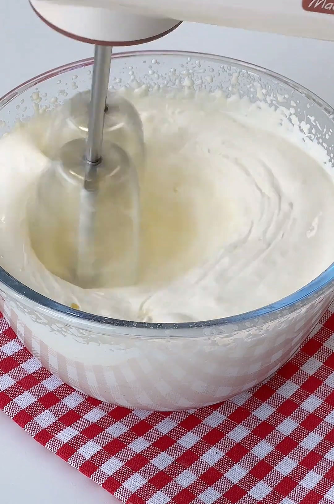 Use the electric mixer on low speed to blend them together until just smooth and no streaks remain
