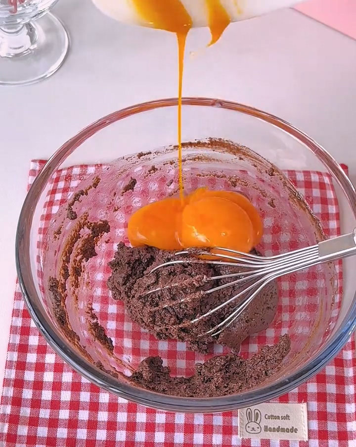 Add the 3 egg yolks to the bowl