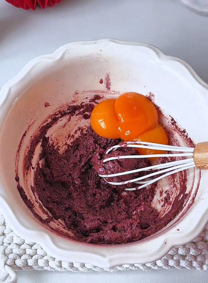 Add the 3 egg yolks to the bowl