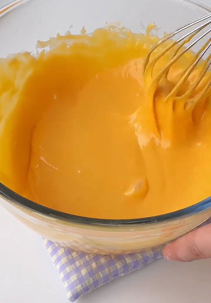 Add the 5 egg yolks and whisk until you have a smooth, lump free batter