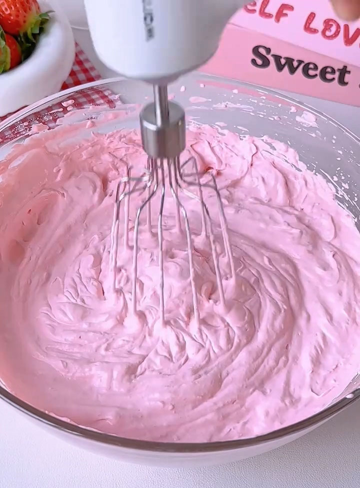 Continue whipping until the cream is thick