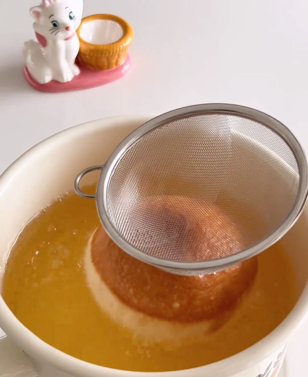 Fry the donuts until golden on both sides