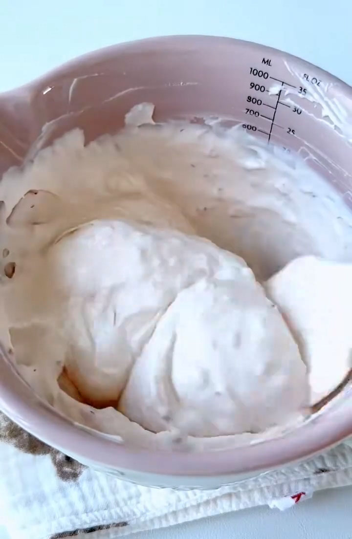 Gently fold the whipped cream into the strawberry cheese mixture