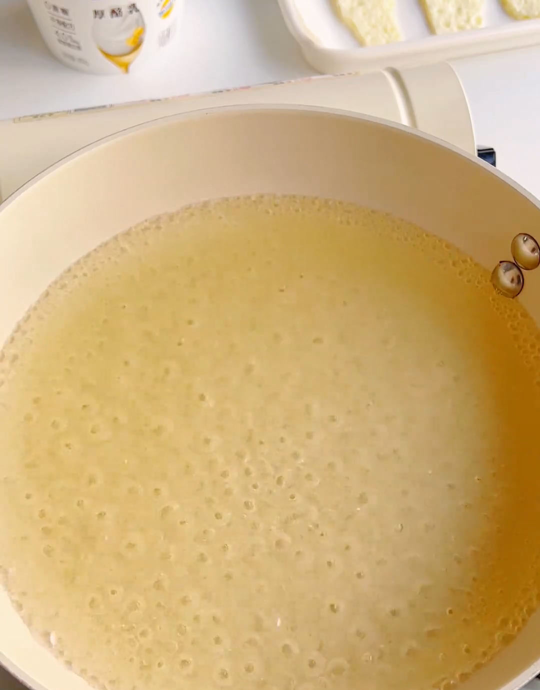 It will first form large, clear bubbles