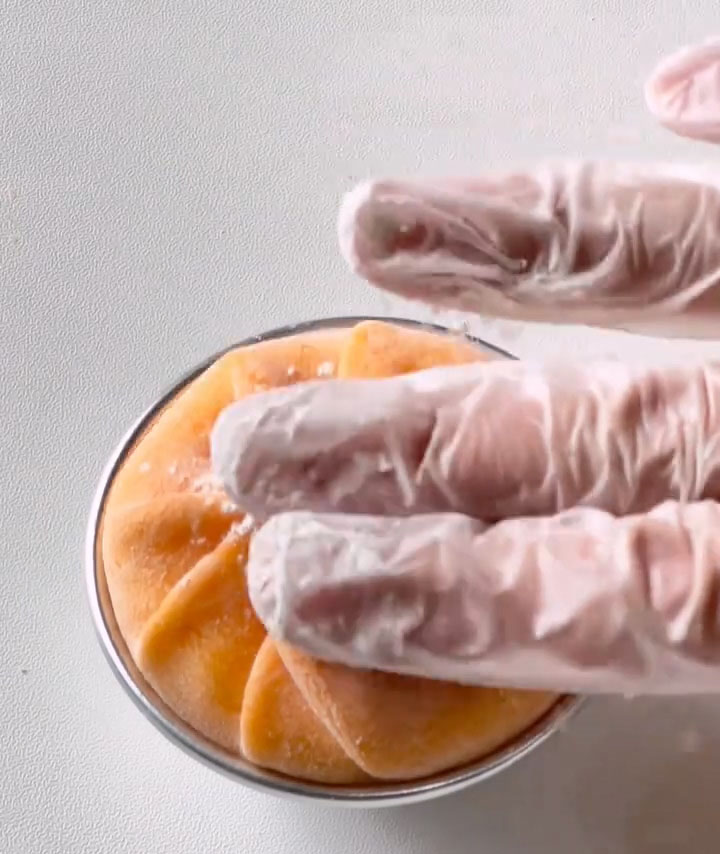 Pinch and pleat the dough together at the top to seal completely