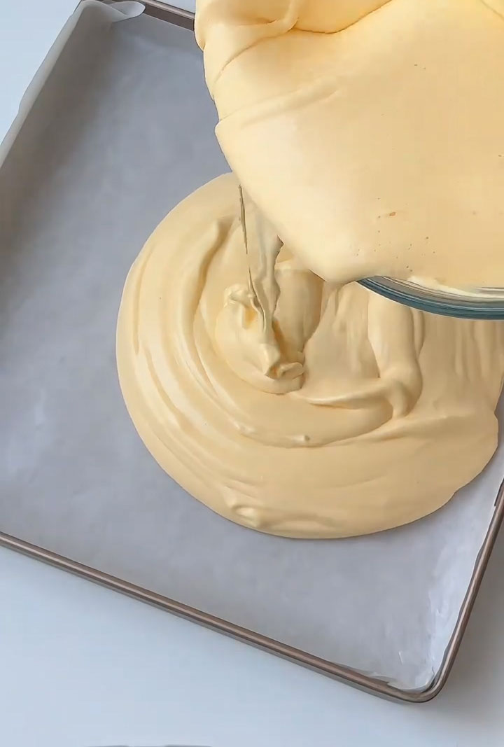 Pour the batter onto the prepared baking sheet