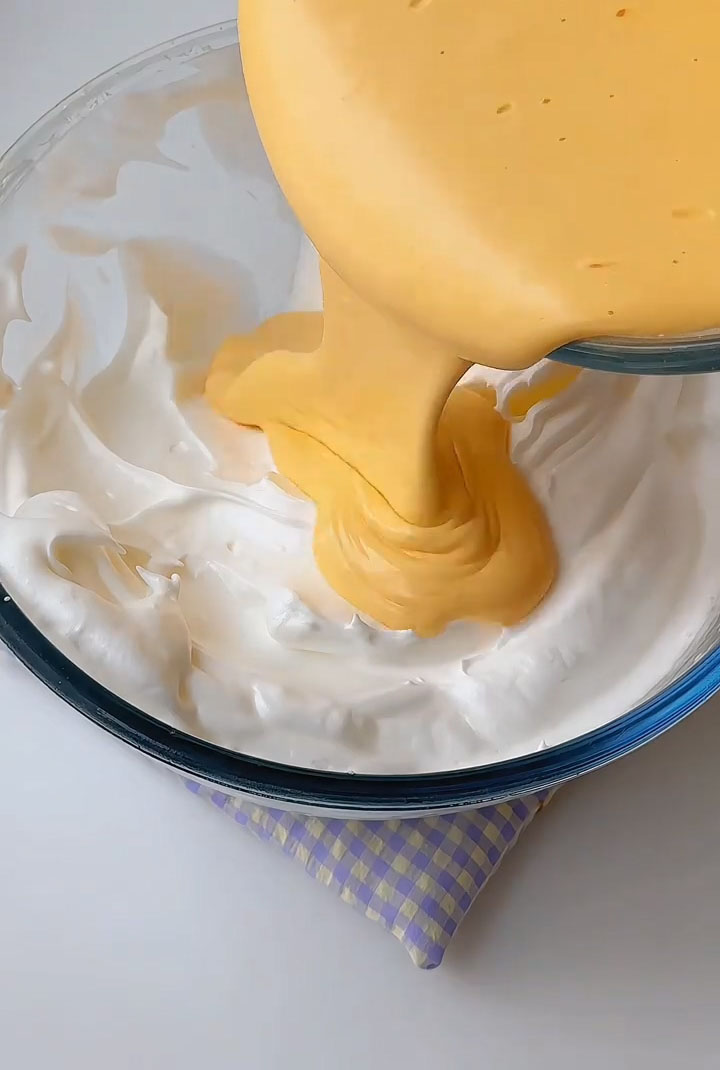 Pour the combined batter back into the remaining meringue