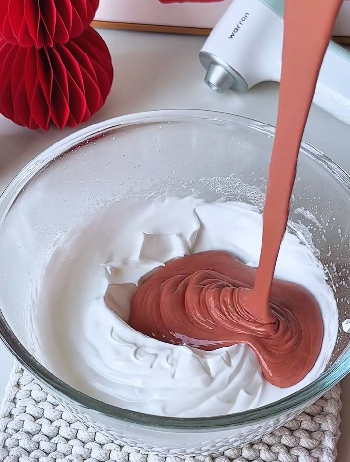 Pour this lightened batter back into the bowl with the remaining meringue