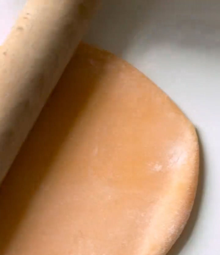 Roll each small dough portion into a thin wrapper