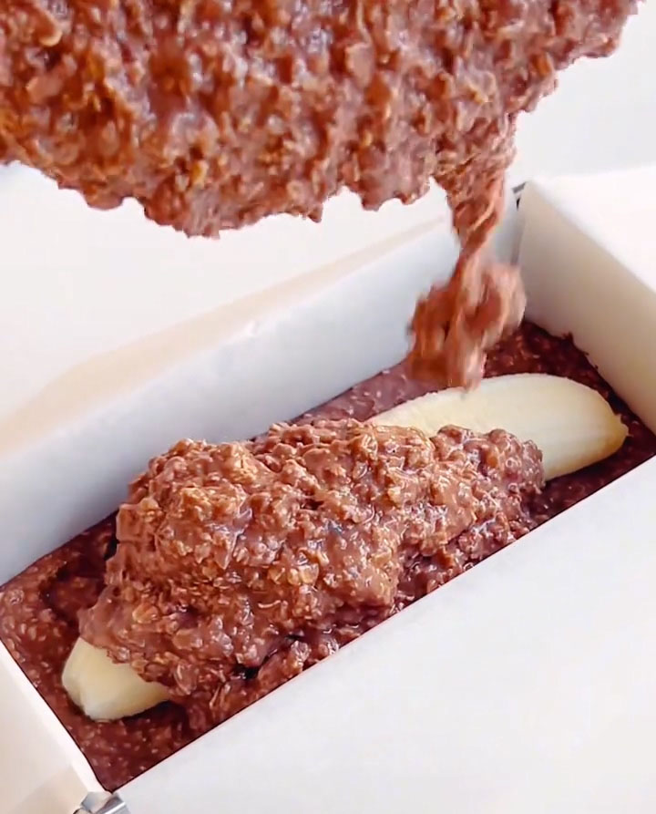 Slowly and carefully pour the remaining batter over the banana