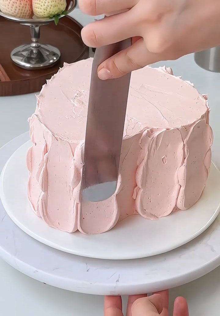 Use a spatula to smooth the cream evenly