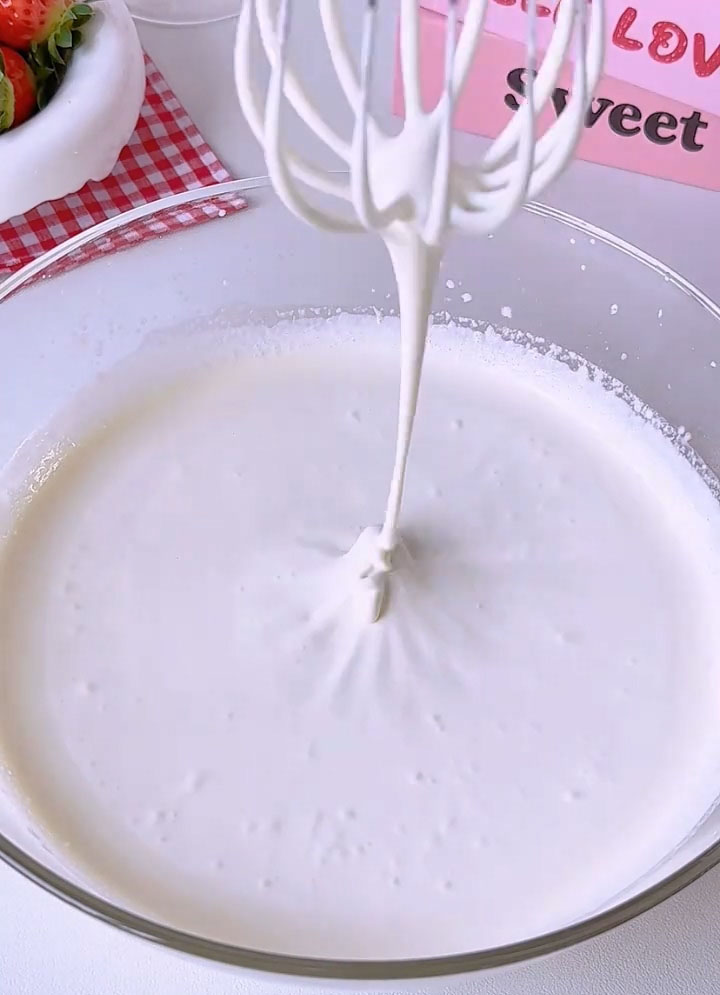 Whip on medium speed until the cream thickens to a yogurt or soft peak consistency