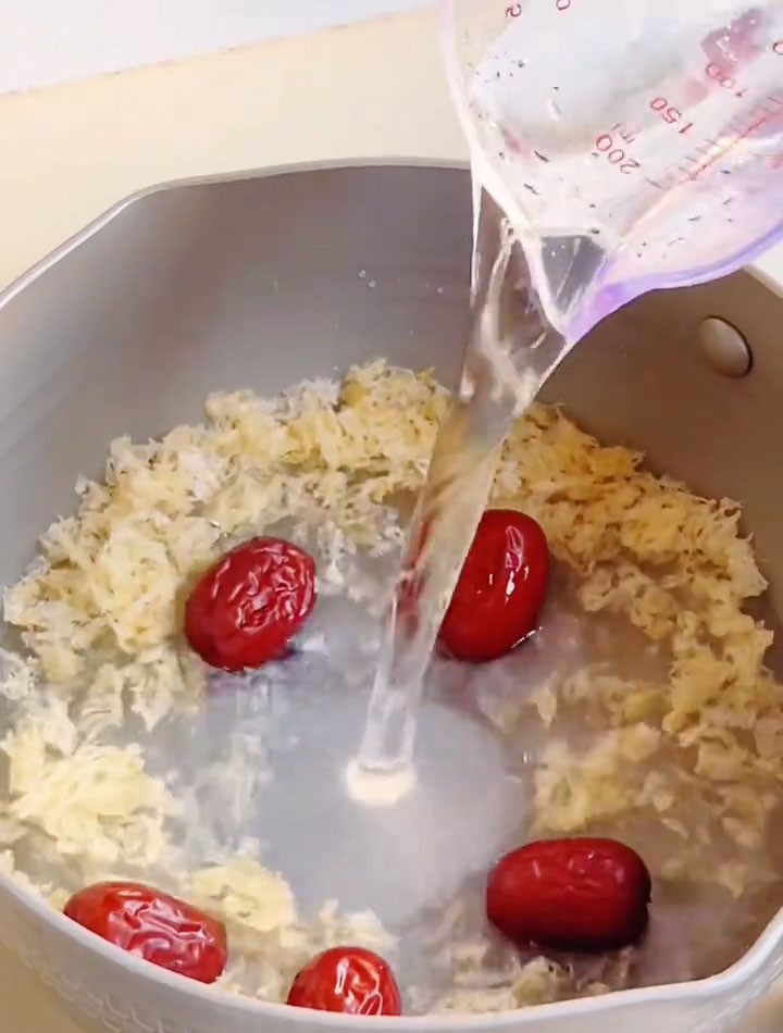 add the organic white fungus and red dates along with enough water