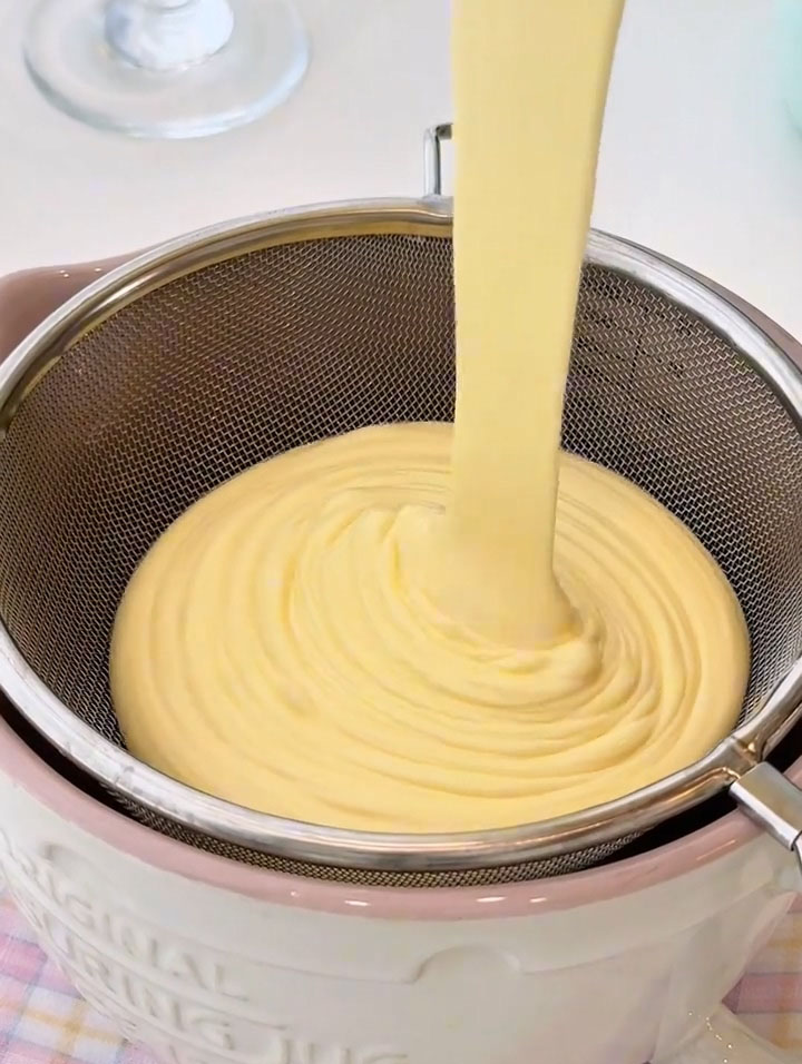pass the entire cheesecake batter through a fine mesh sieve