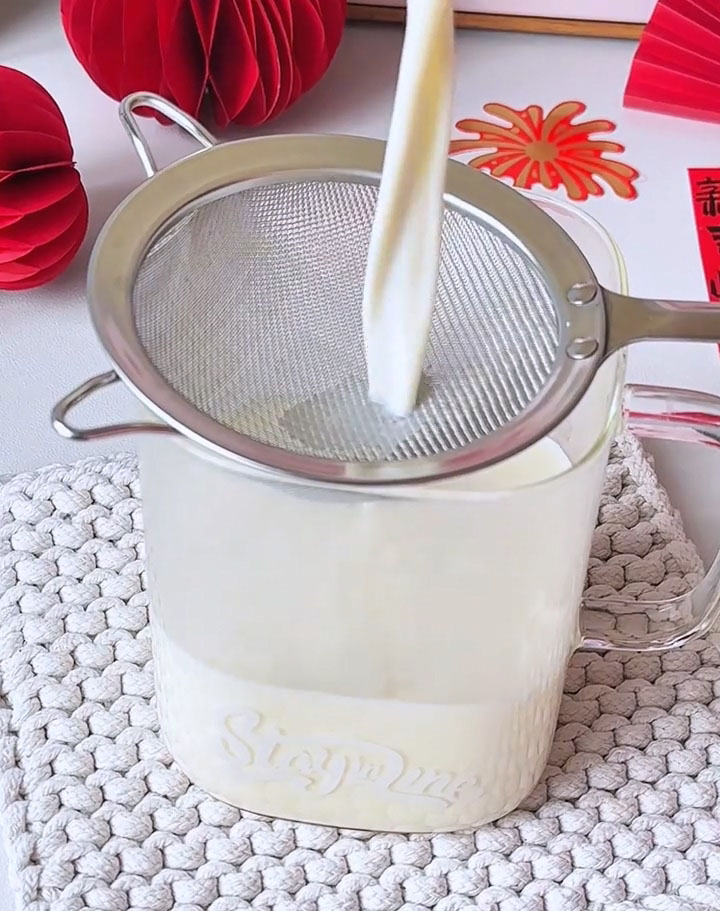 pour the milk mixture through a fine mesh sieve
