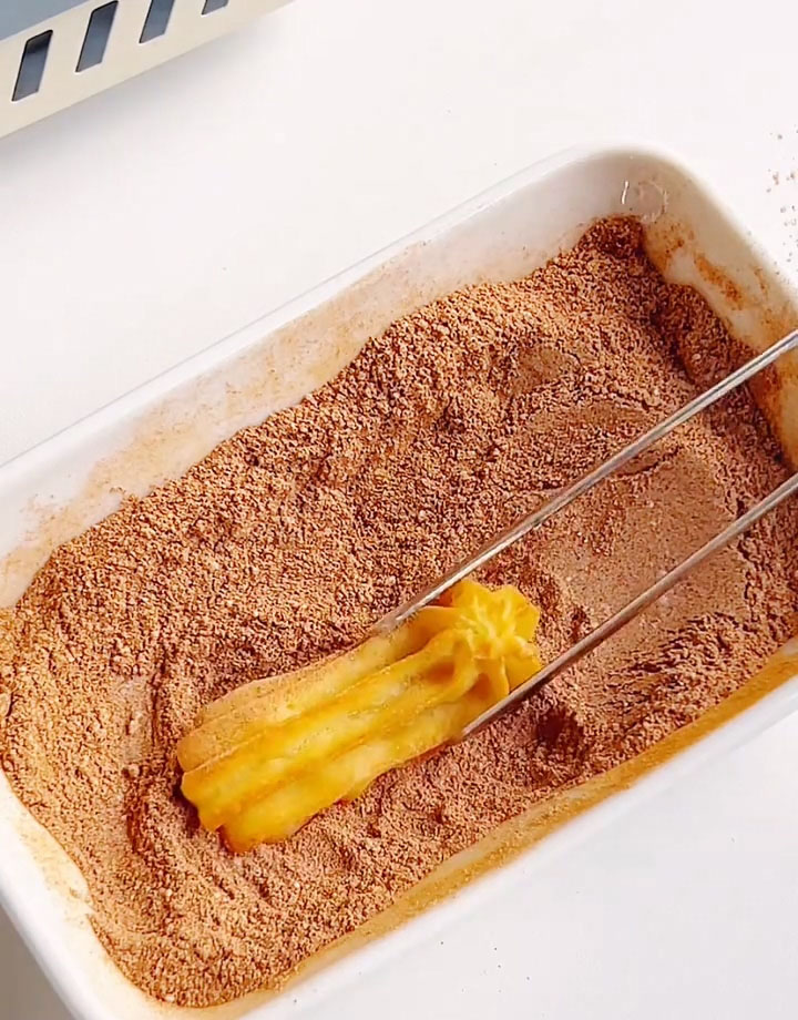 roll each one generously in the cinnamon sugar mixture until fully coated