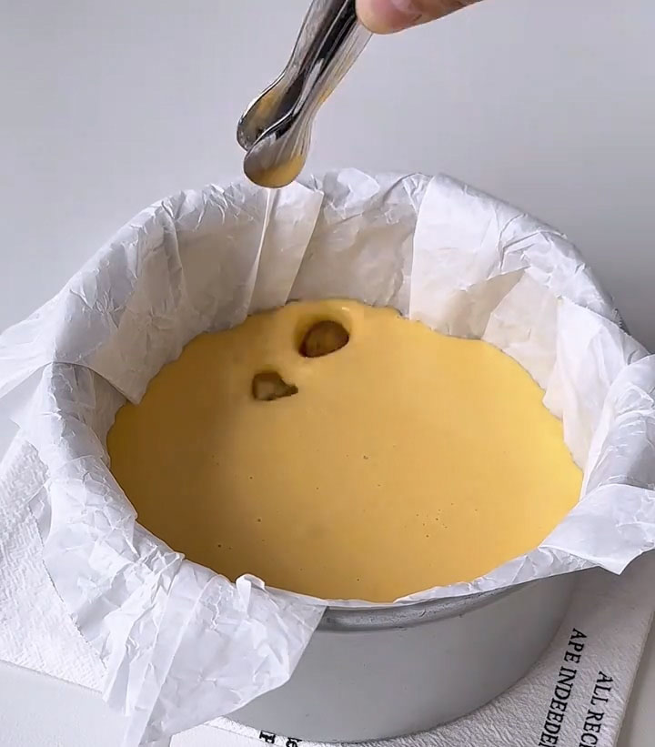 scatter the chopped pieces evenly over this first layer of batter