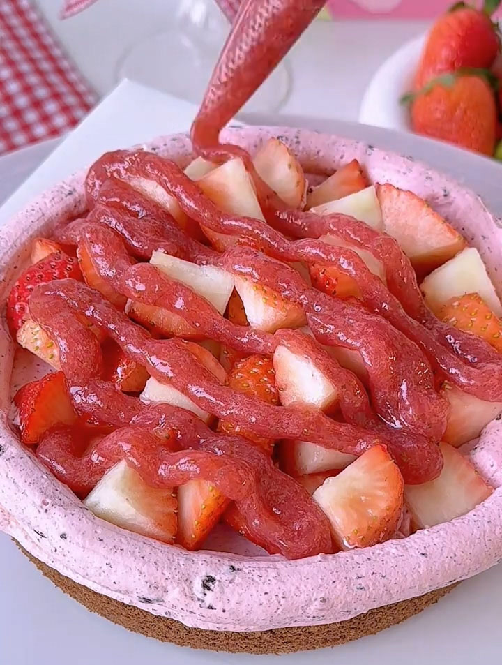 spread a layer of extra strawberry jam