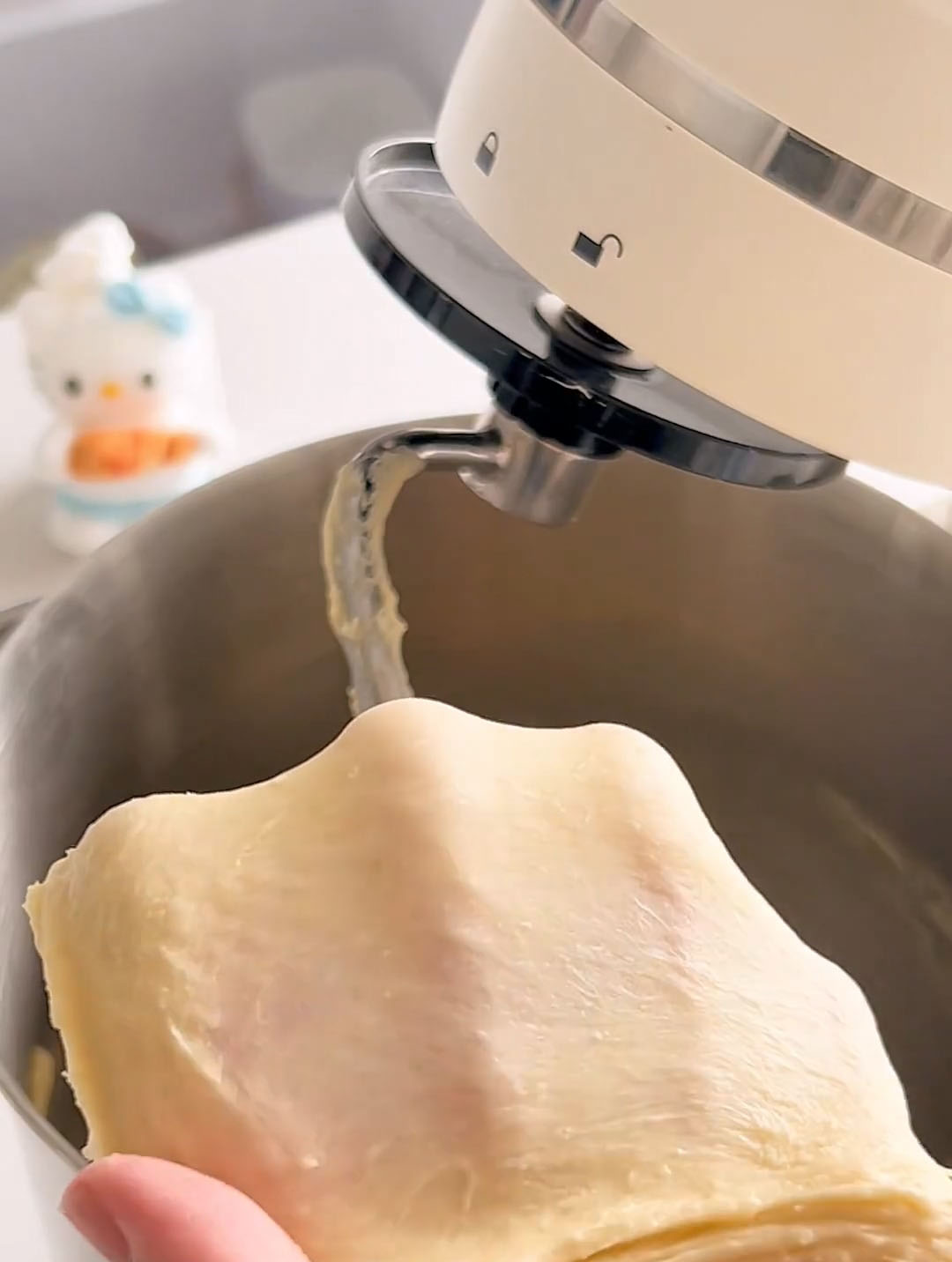 the dough is very smooth, elastic, and passes the windowpane test