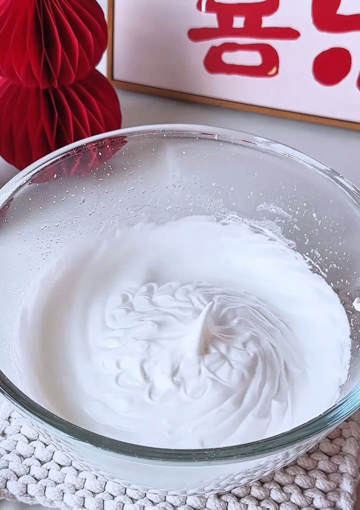 when you lift the whisk, the peak should gently curve over