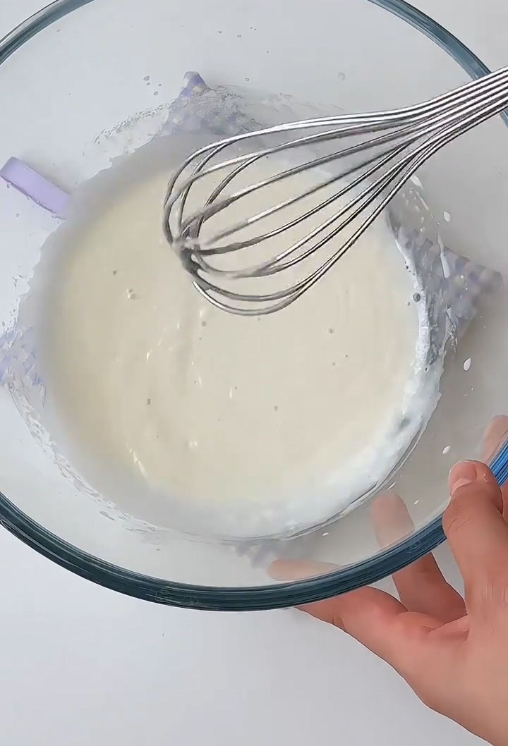 whisk together the milk and corn oil