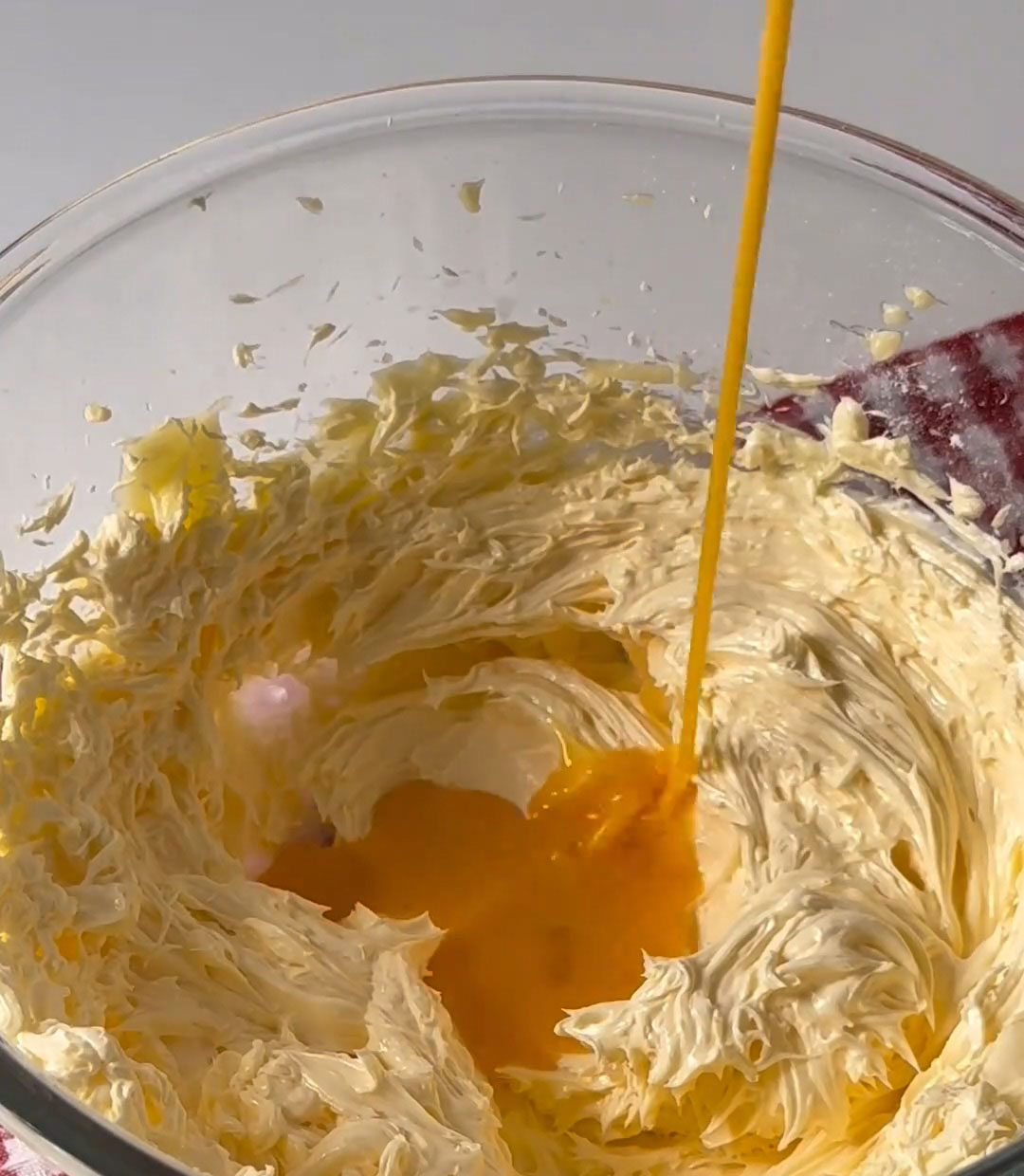 Add the egg gradually in small batches