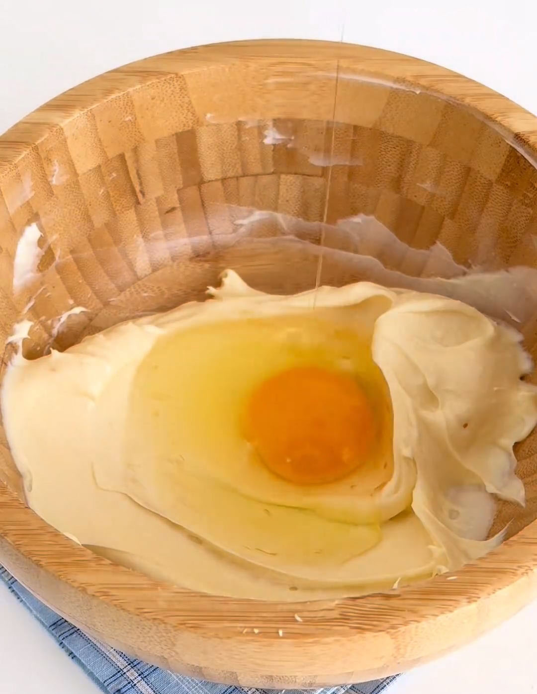 Add the eggs one at a time