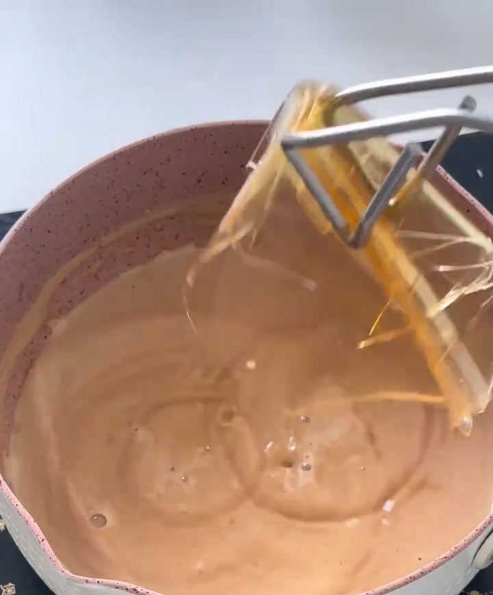 Add the squeezed gelatin to the warm milk mixture