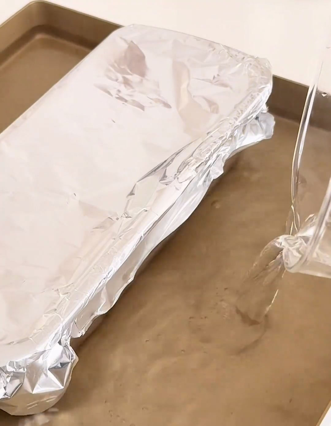 Carefully pour the hot water from your kettle into the pan