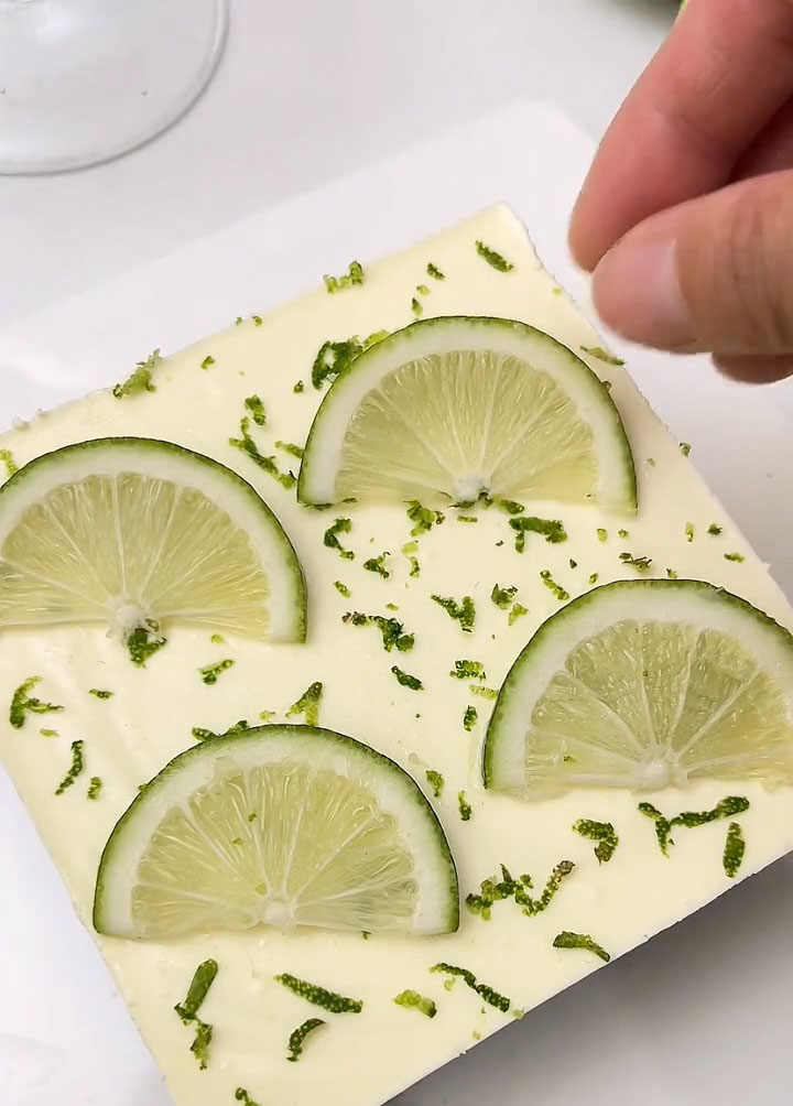 Garnish with lime slices, lime zest