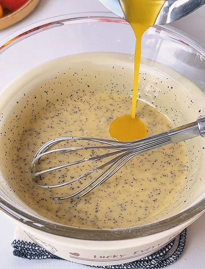 Gradually add it to the batter in 2–3 additions