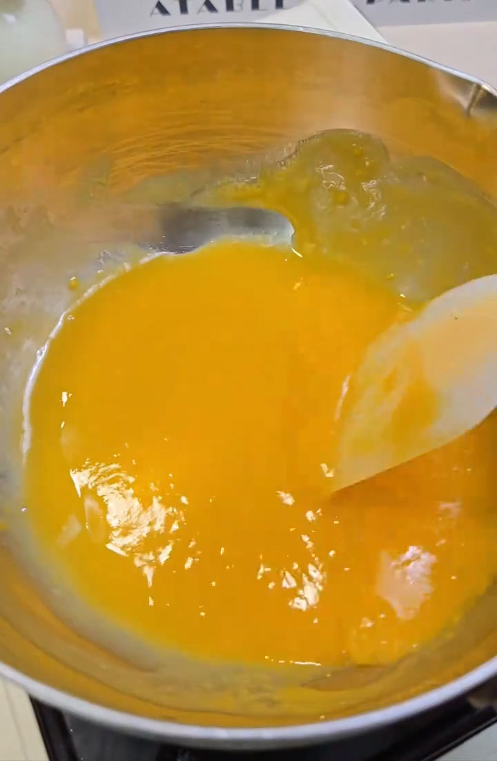 Heat over low flame, stirring, just until the sugar has dissolved