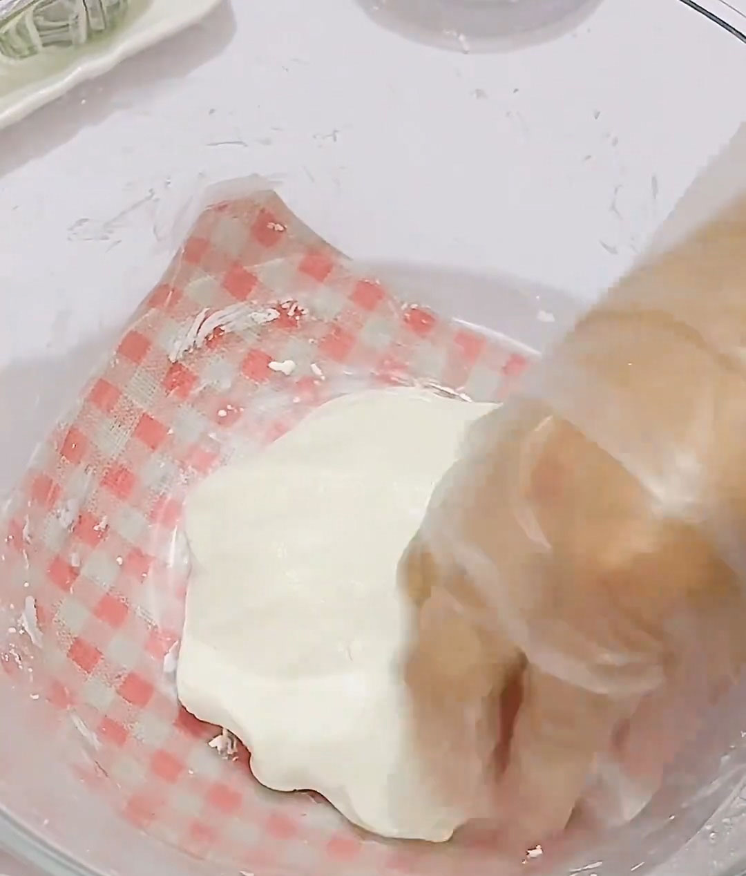 Knead the mixture until it forms a smooth, pliable dough that does not crack when you press it
